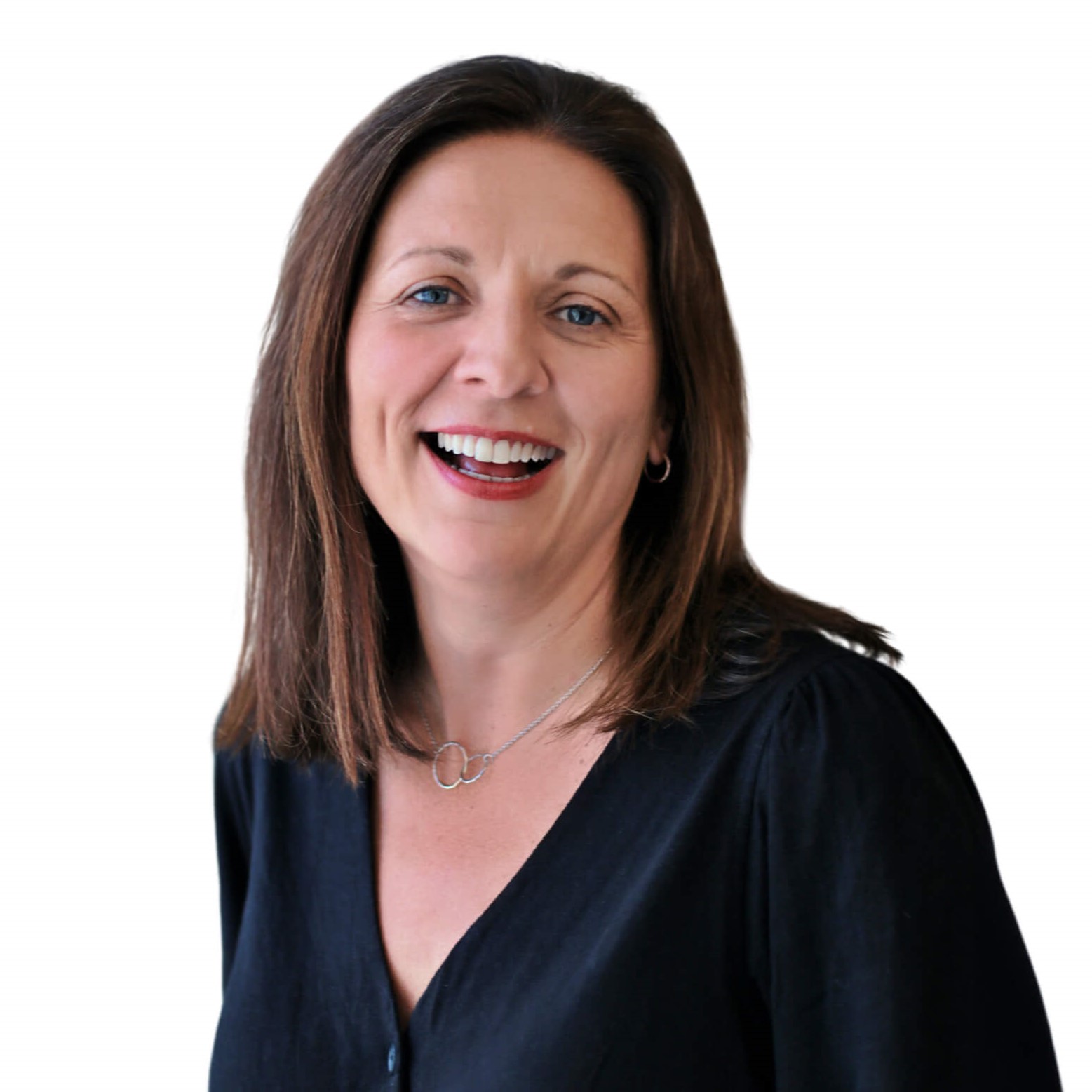 A woman with brown hair dressed in a black top, smiling softly.