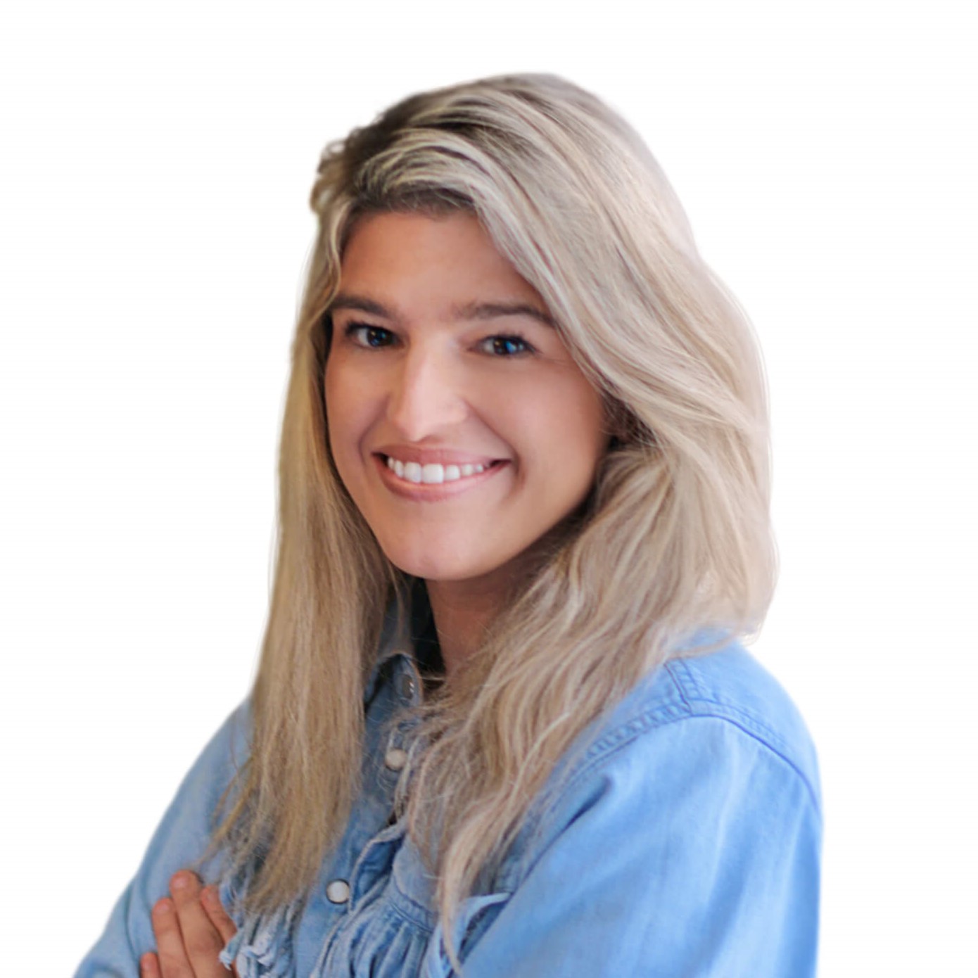 A woman with long blonde hair wearing a blue shirt smiles at the camera.